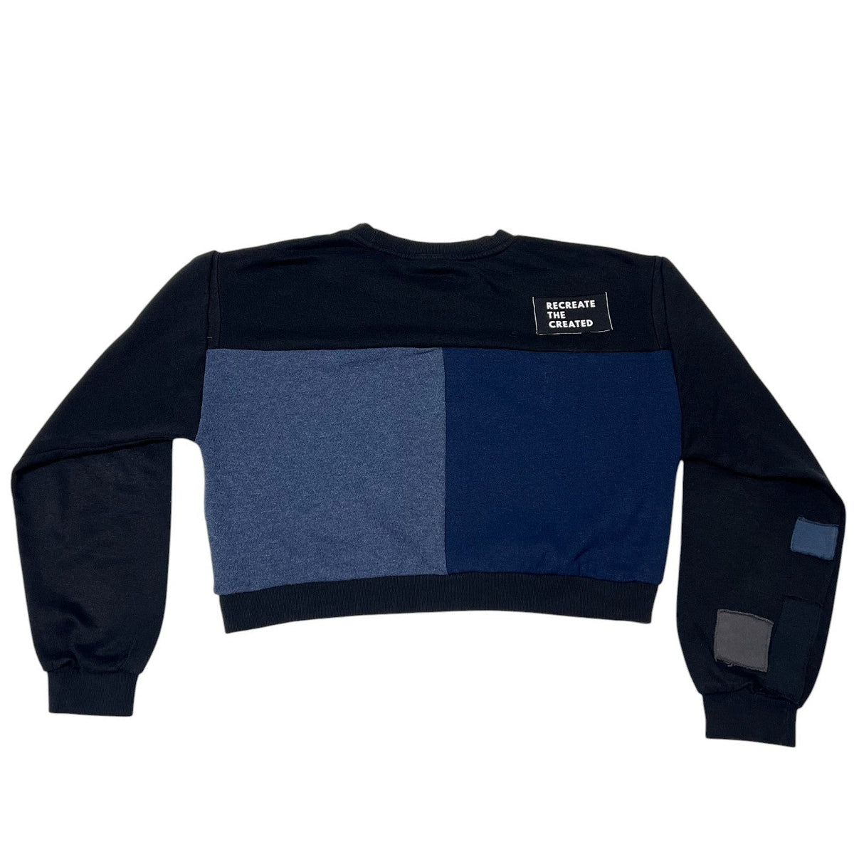 Black and blue color-blocked sweatshirt with a patch on the back against a white background